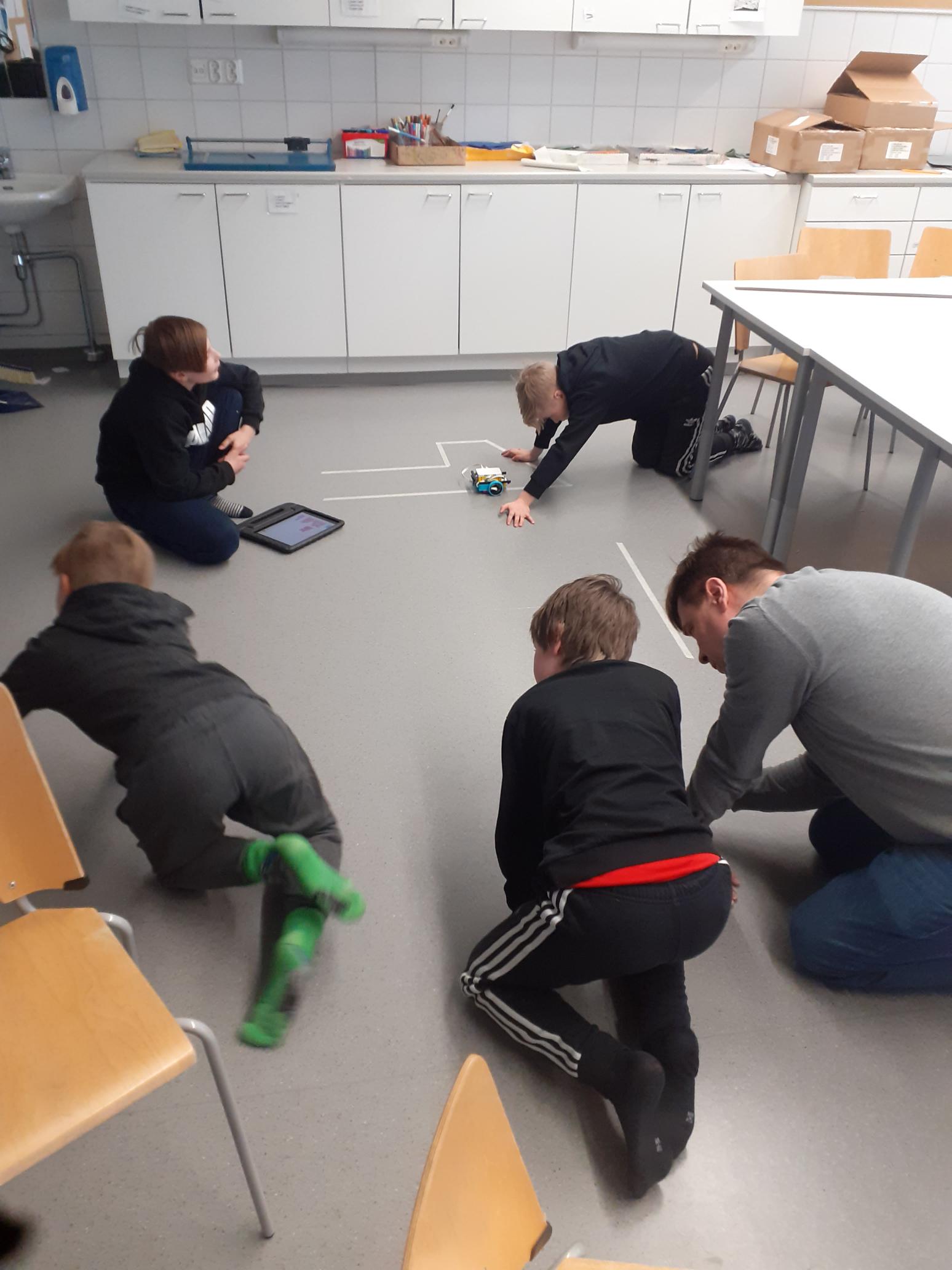 Coding a lego robot moving on a line