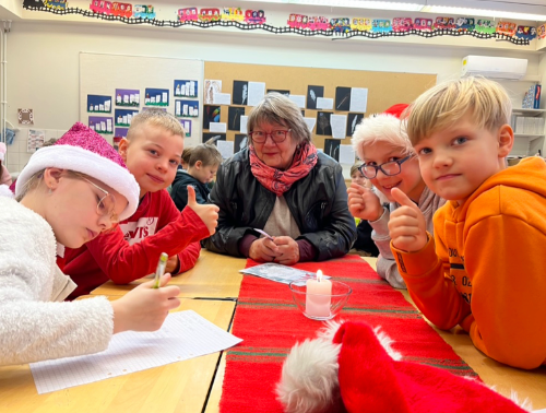 Reading granny Pirjo with her reading group. 