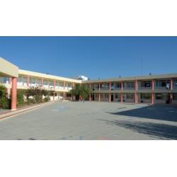 Part of the school yard. Usually school buildings shape letter Π in Greek.